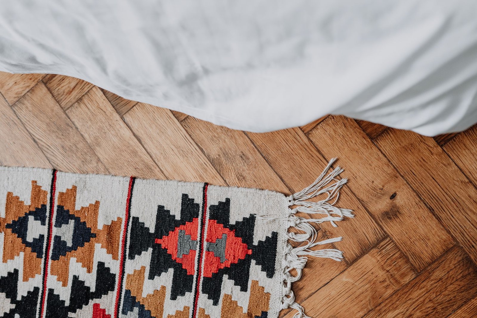 Large Woven Cotton Rug bedroom — cozy home
